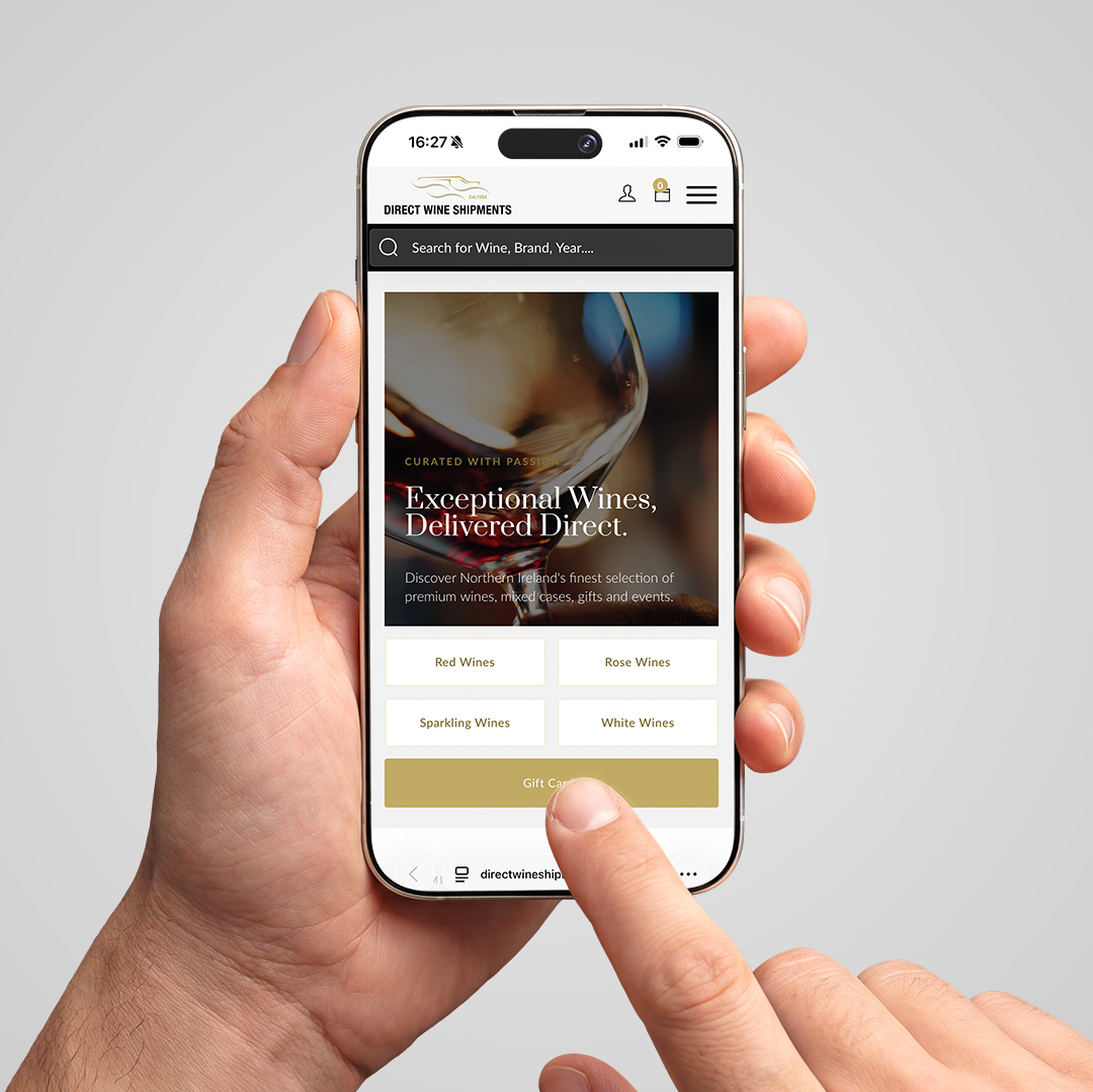 A customer browsing the Direct Wine Shipments homepage on a mobile phone